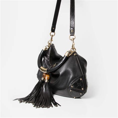 gucci crystal hobo drawstring bamnoo tassel shoulder bag|Gucci dionysus bag.